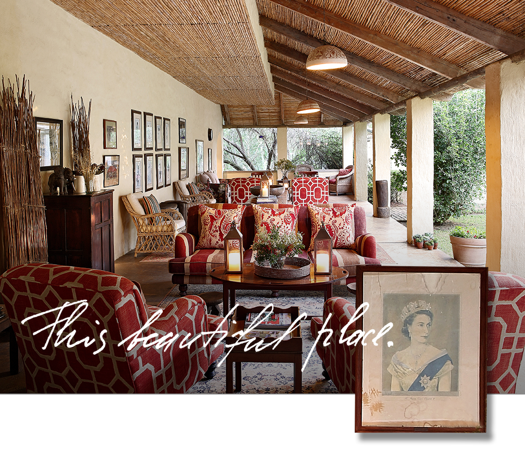 Luxurious Elephant House verandah with couches, armchairs and framed prints.